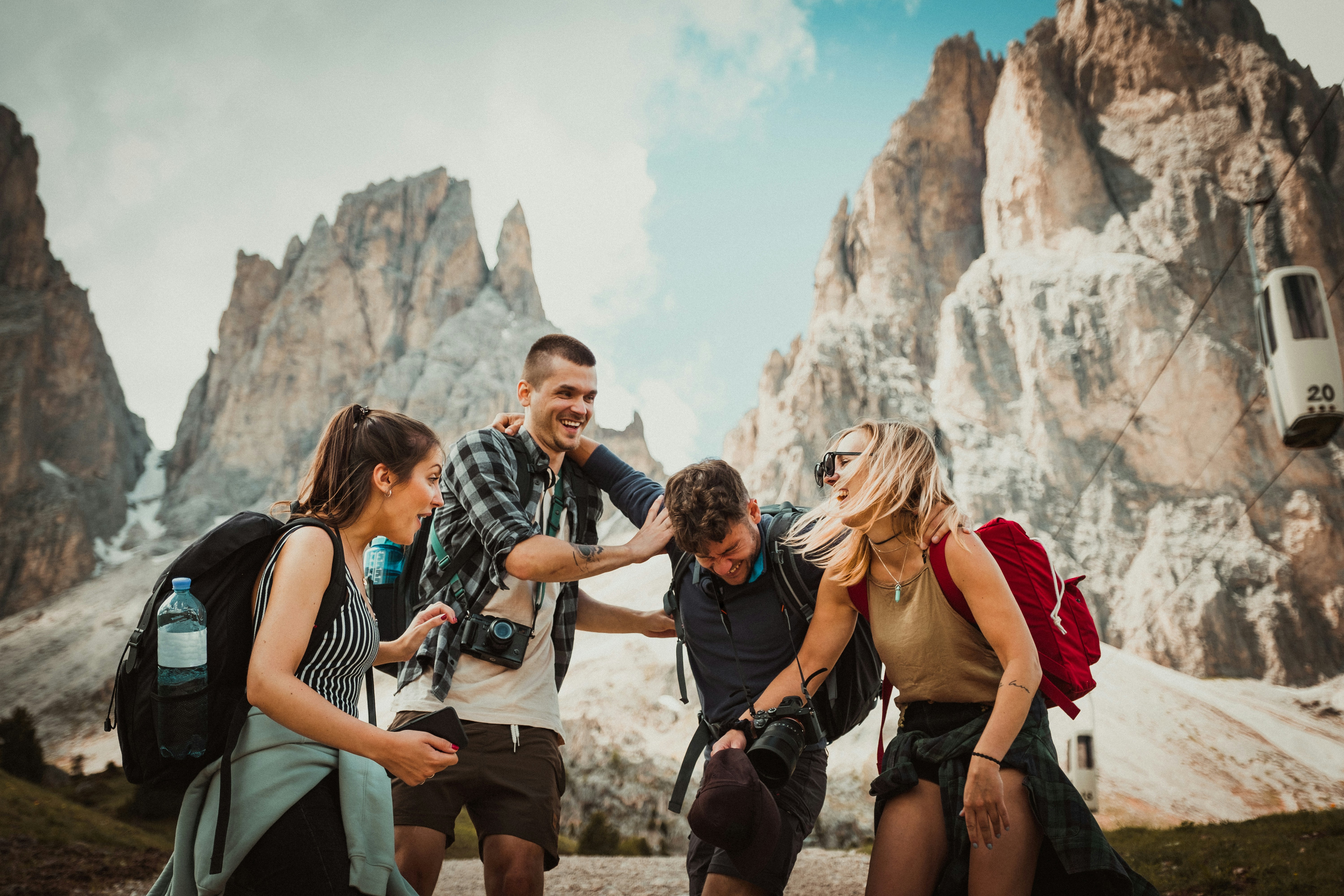 Group of people in front of a mountain